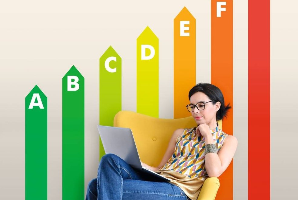 illustration of woman sitting on sofa with energy efficiency rating background